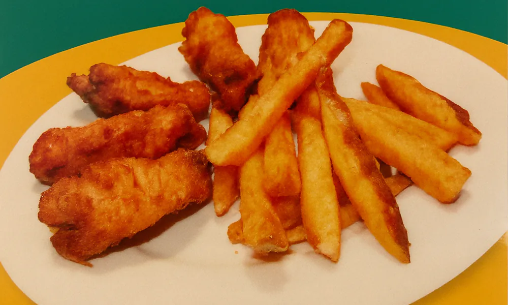 Crispy fried fish sticks served with golden fries at Lanikai BBQ Tea House, a Asian Fusion Restaurant in San Francisco