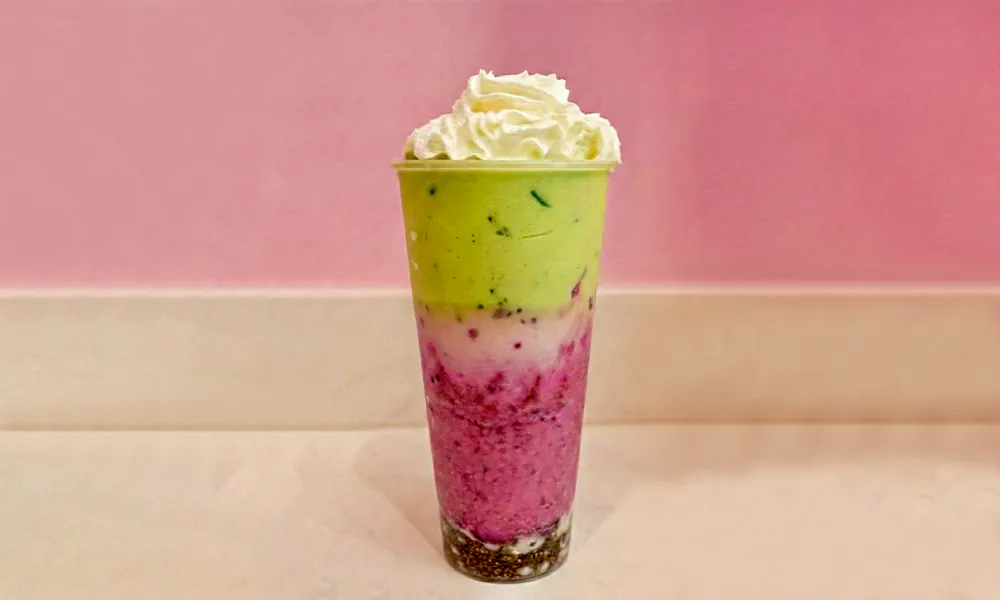 Layered smoothie with matcha, dragon fruit and mango at Lanikai BBQ Tea House, a Asian Fusion Restaurant in San Francisco